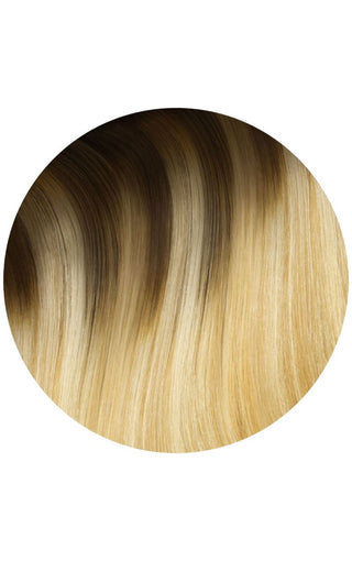 Rooted Golden Balayage with Highlights swatch of hair strand example on a white background