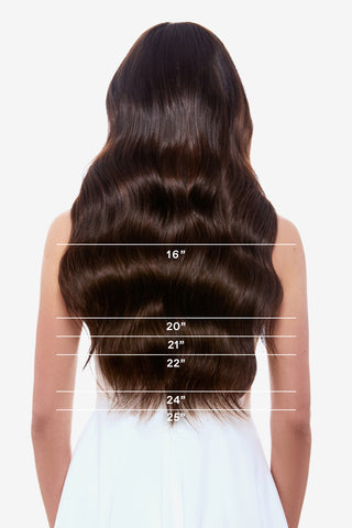 The back of a woman's head with long, wavy brown hair showcasing different hair extension lengths, ranging from 16" to 25".